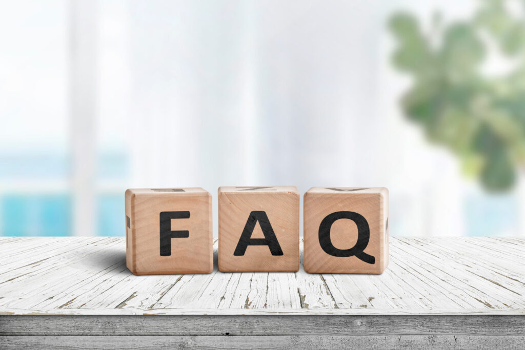 FAQ answers and questions sign made of wooden blocks
